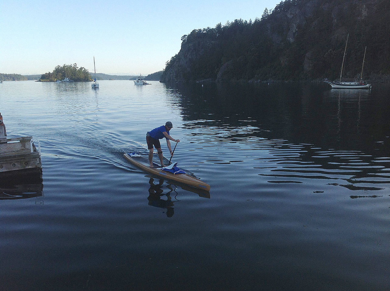 Karl Kruger, 45, paddles toward Ketchikan, Alaska, last summer. Kruger is the first person to finish the Race to Alaska on a stand-up paddleboard. (Photo courtesy of Karl Kruger)