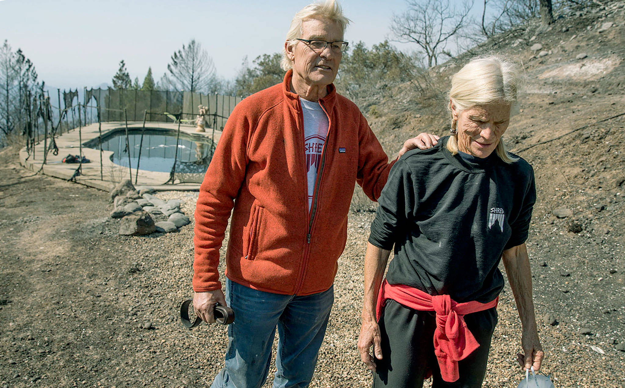 John and Jan Pascoe survived a firestorm Monday by running out of their home and into their neighbors’ swimming pool in Santa Rosa, California. (Brian van der Brug/Los Angeles Times/TNS)