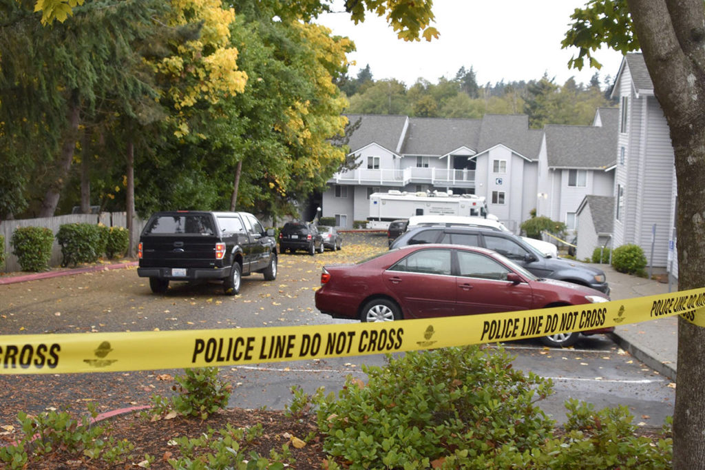 Sheriff’s deputies cordoned Bristol Square Apartments in Lynnwood where a boy, 6, was found dead in a Dumpster early Tuesday. Dayvid Pakko was reported missing around 2:30 p.m. Monday in the 15700 block of 44th Avenue W. (Caleb Hutton / The Herald)
