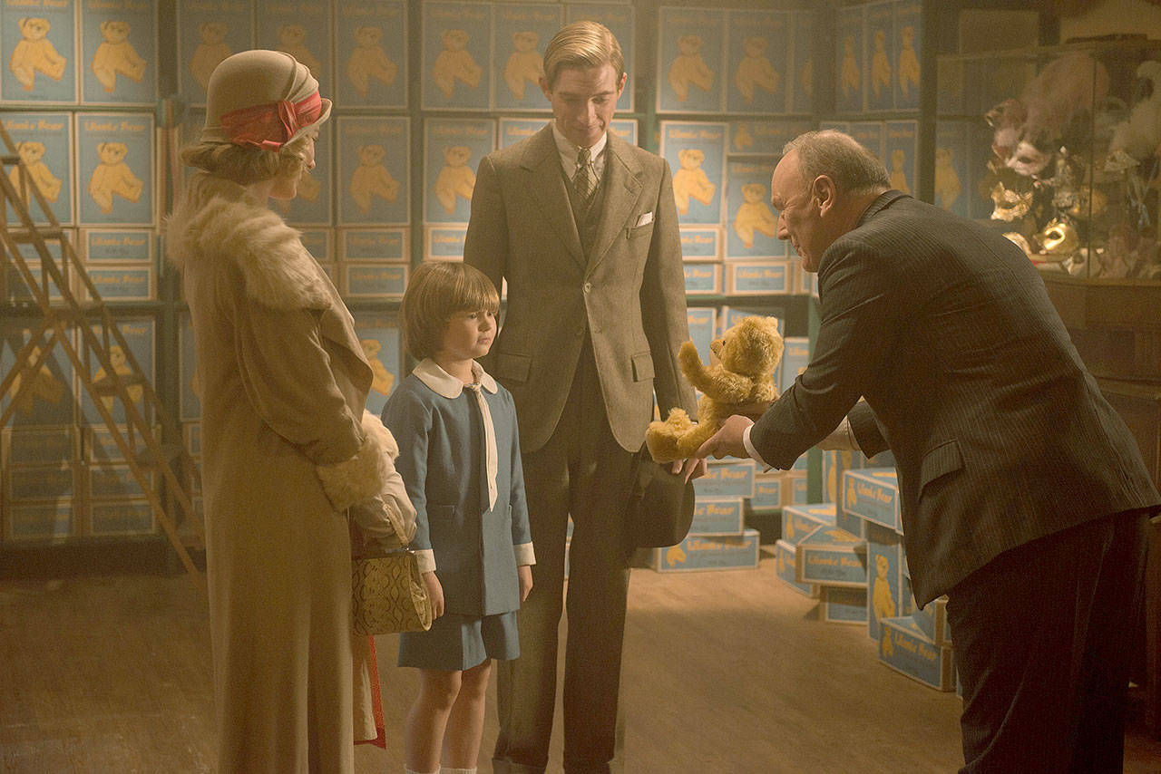 Margot Robbie (left), Will Tilston, Domhnall Gleeson and Richard Clifford star in “Goodbye Christopher Robin.” (David Appleby/Twentieth Century Fox Film Corporation)