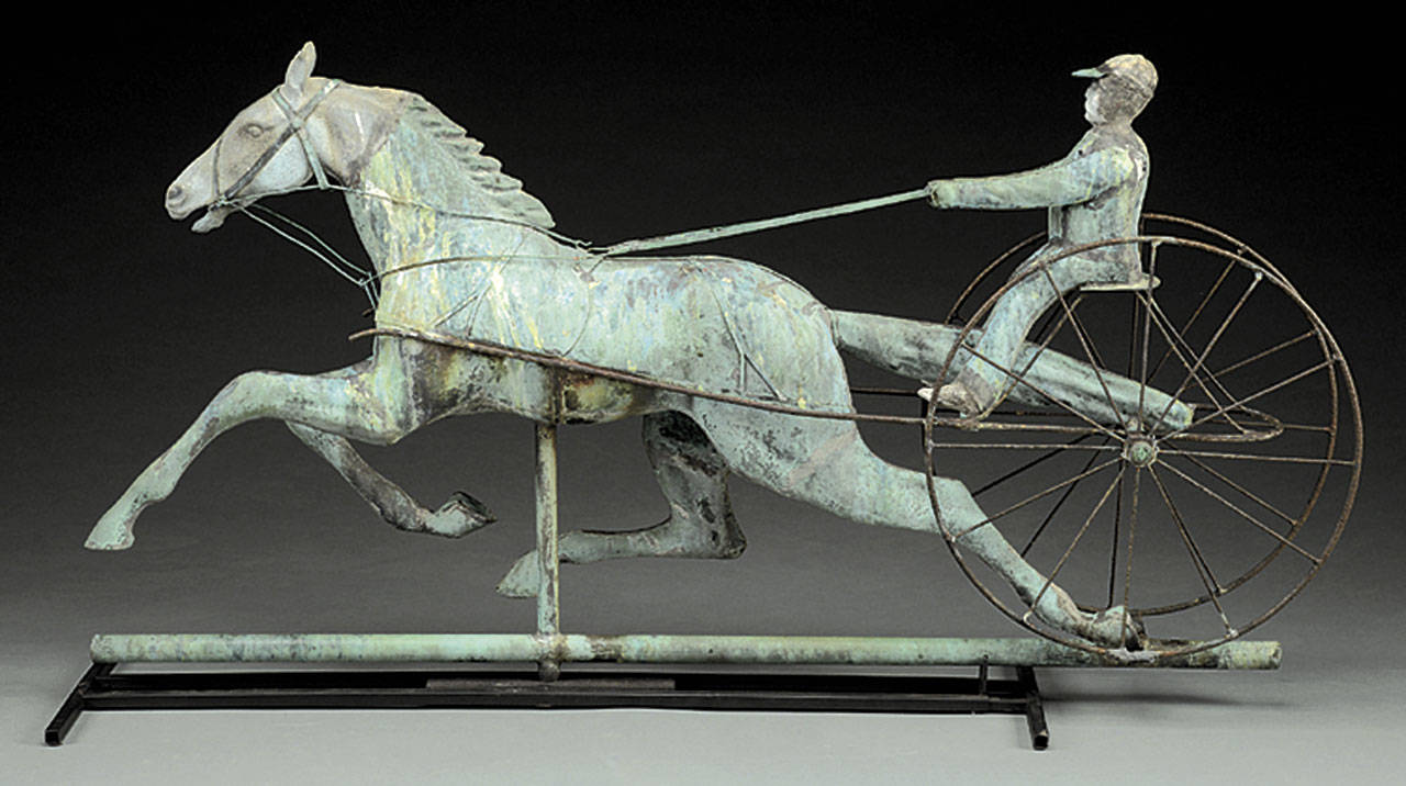 This late 19th-century weathervane is a full-bodied horse with a cast zinc head and a sulky driver with cast head and boots. It was made by Fiske & Co. The 45-inch-long vane cost more than $18,000. (Cowles Syndicate Inc.)