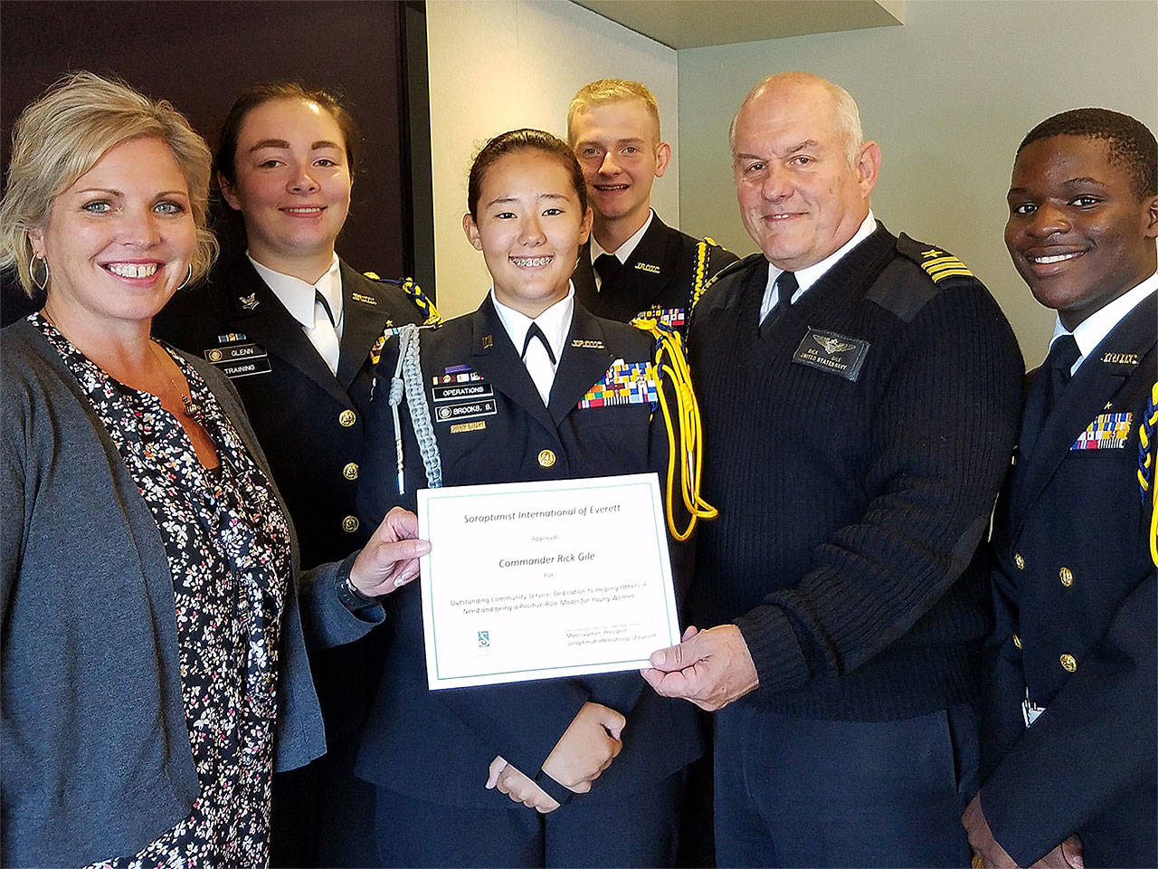 Soroptimist International of Everett President Marci Volmer (left) presents Everett High School Navy Junior ROTC Commander Rick Gile (second from right) with a certificate of recognition. Also pictured, from left, are Petty Officer 2 Samantha Glen, Lt Junior Grade Su Brooks, Petty Officer 1 Winter Mathison and Chief Salah Luhizo. (Contributed photo)