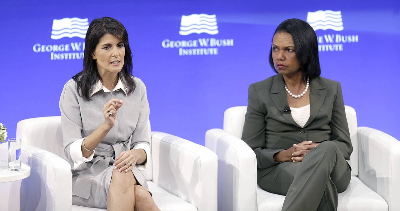 U.S. Ambassador to the United Nations Nikki Haley (left) and former U.S. Secretary of State Condoleezza Rice participate in a panel discussion at a forum sponsored by the George W. Bush Institute in New York on Thursday. (AP Photo/Seth Wenig)