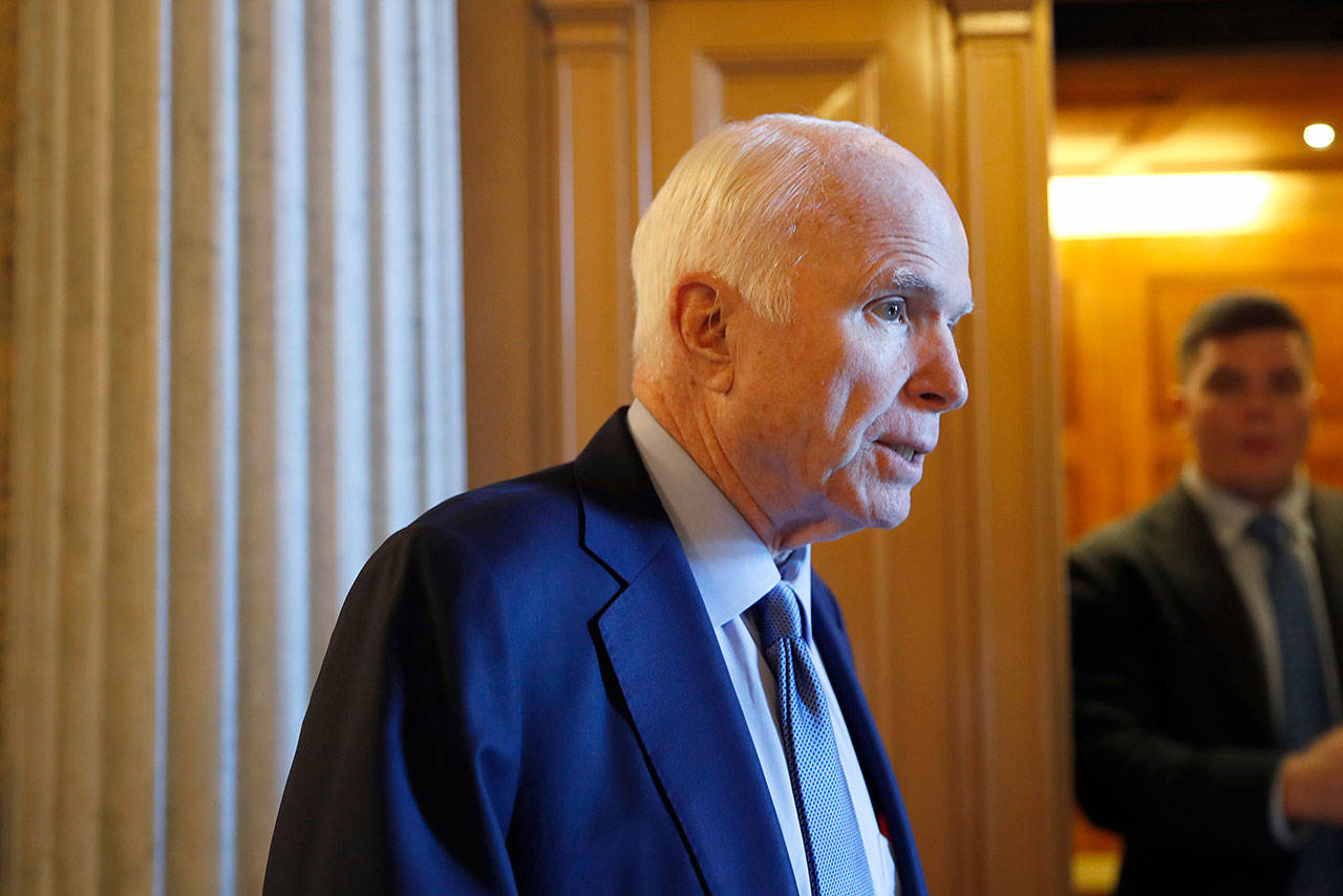 Sen. John McCain, R-Ariz., speaks to reporters Thursday on Capitol Hill in Washington, D.C. (Jacquelyn Martin / Associated Press)