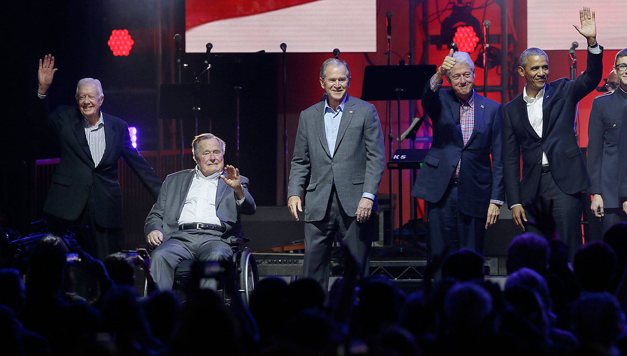 Former Presidents from right, Barack Obama, Bill Clinton, George W. Bush, George H.W. Bush and Jimmy Carter gather on stage at the opening of a hurricanes relief concert in College Station, Texas, Saturday, Oct. 21, 2017. All five living former U.S. presidents joined to support a Texas concert raising money for relief efforts from Hurricane Harvey, Irma and Maria’s devastation in Texas, Florida, Puerto Rico and the U.S. Virgin Islands. (AP Photo/LM Otero)