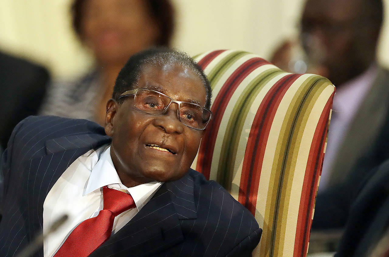In this photo dated Oct. 3, Zimbabwe’s President Robert Mugabe is shown during his meeting with South African President Jacob Zuma at the Presidential Guesthouse in Pretoria, South Africa. (AP Photo/Themba Hadebe)
