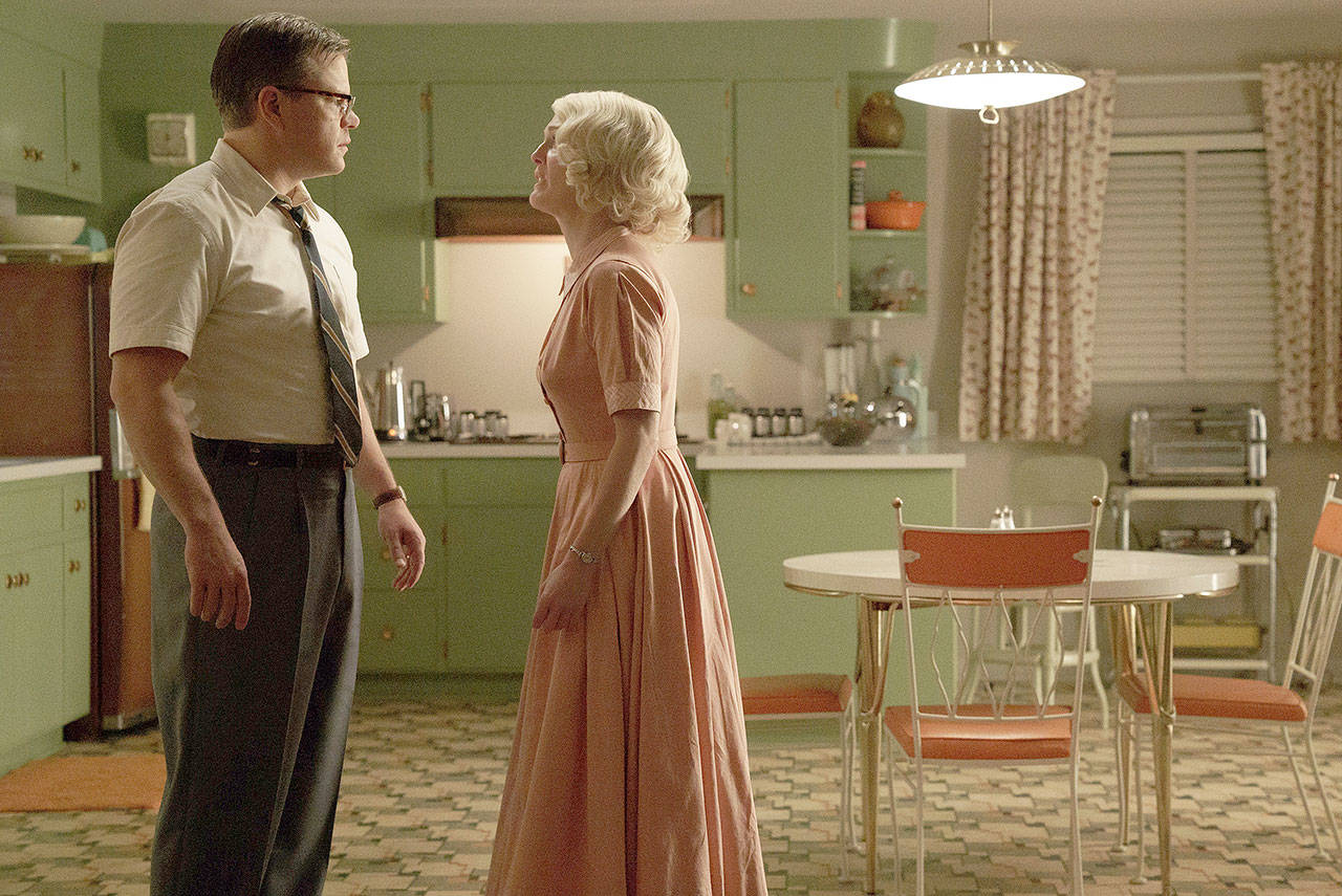 Matt Damon and Julianne Moore play a 1950s suburban couple in “Suburbicon.” (Paramount Pictures)