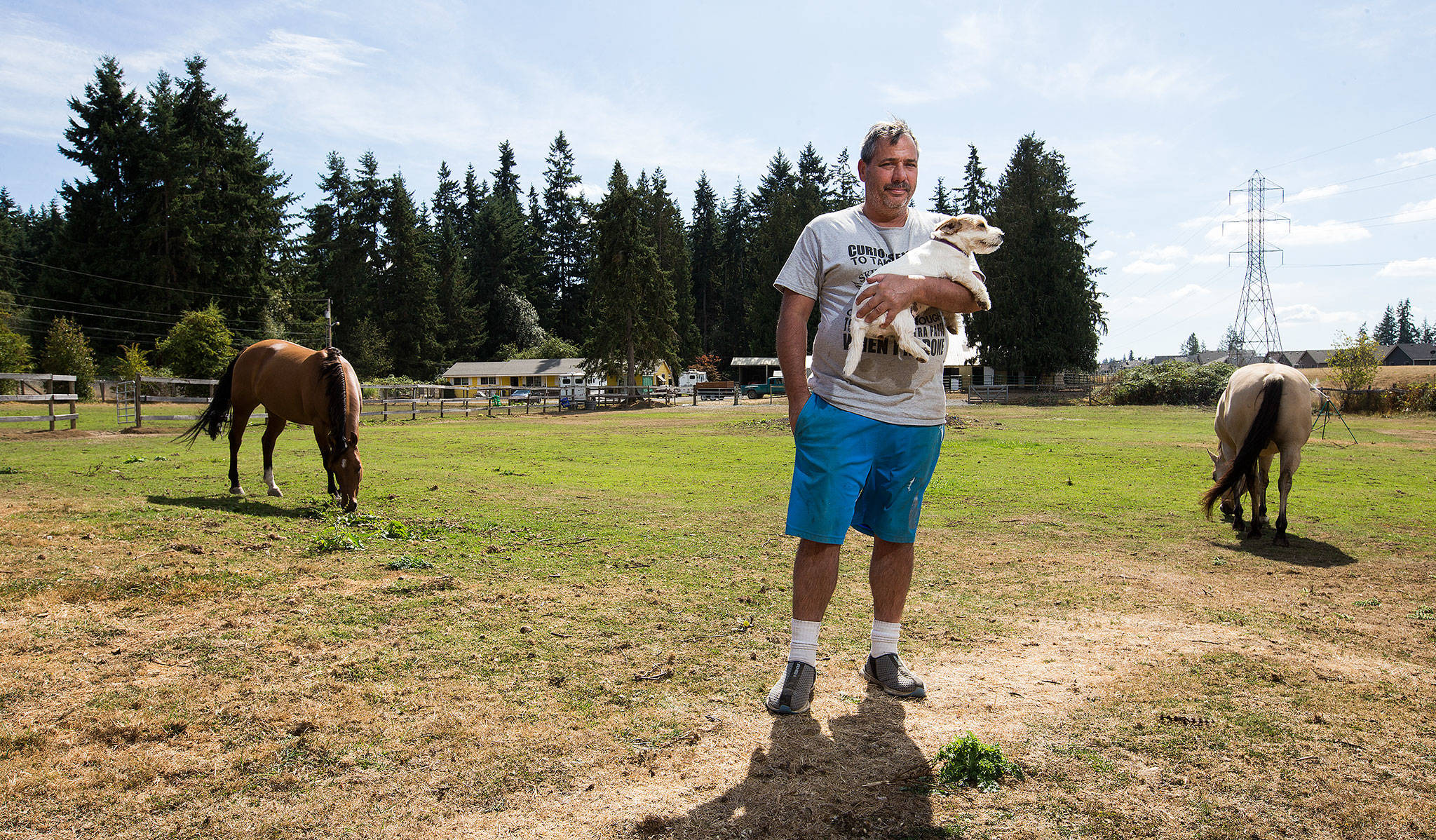 Leo Gese stands in a pasture at his home on 174th Street SE in Bothell. He and his wife, Marla Gese, fought an effort by the Everett School Board to condemn their land for a future high school. (Andy Bronson / The Herald)