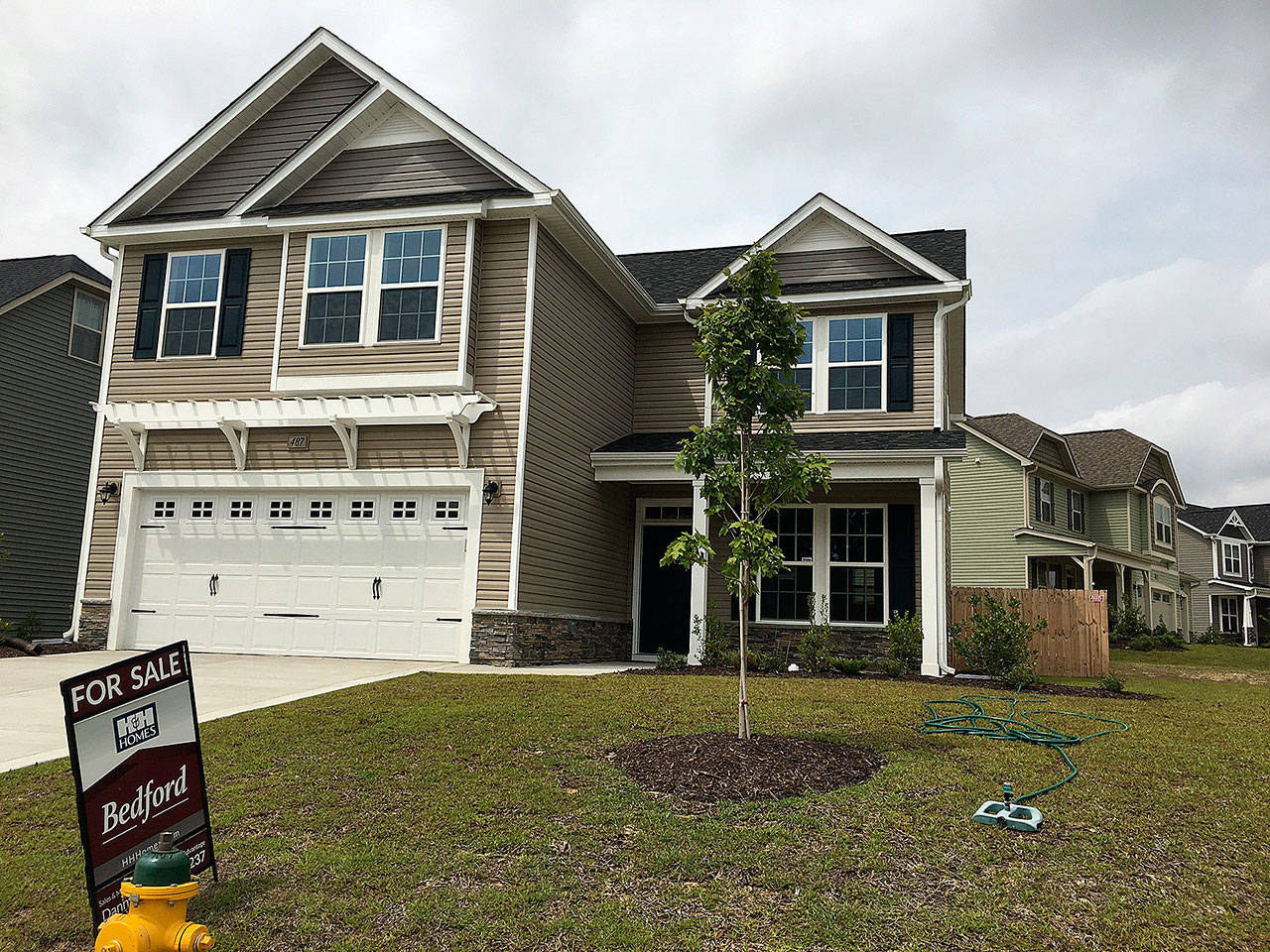 A new home for sale is seen in a housing development in Raeford, North Carolina, in September. (AP Photo/Swayne Hall)