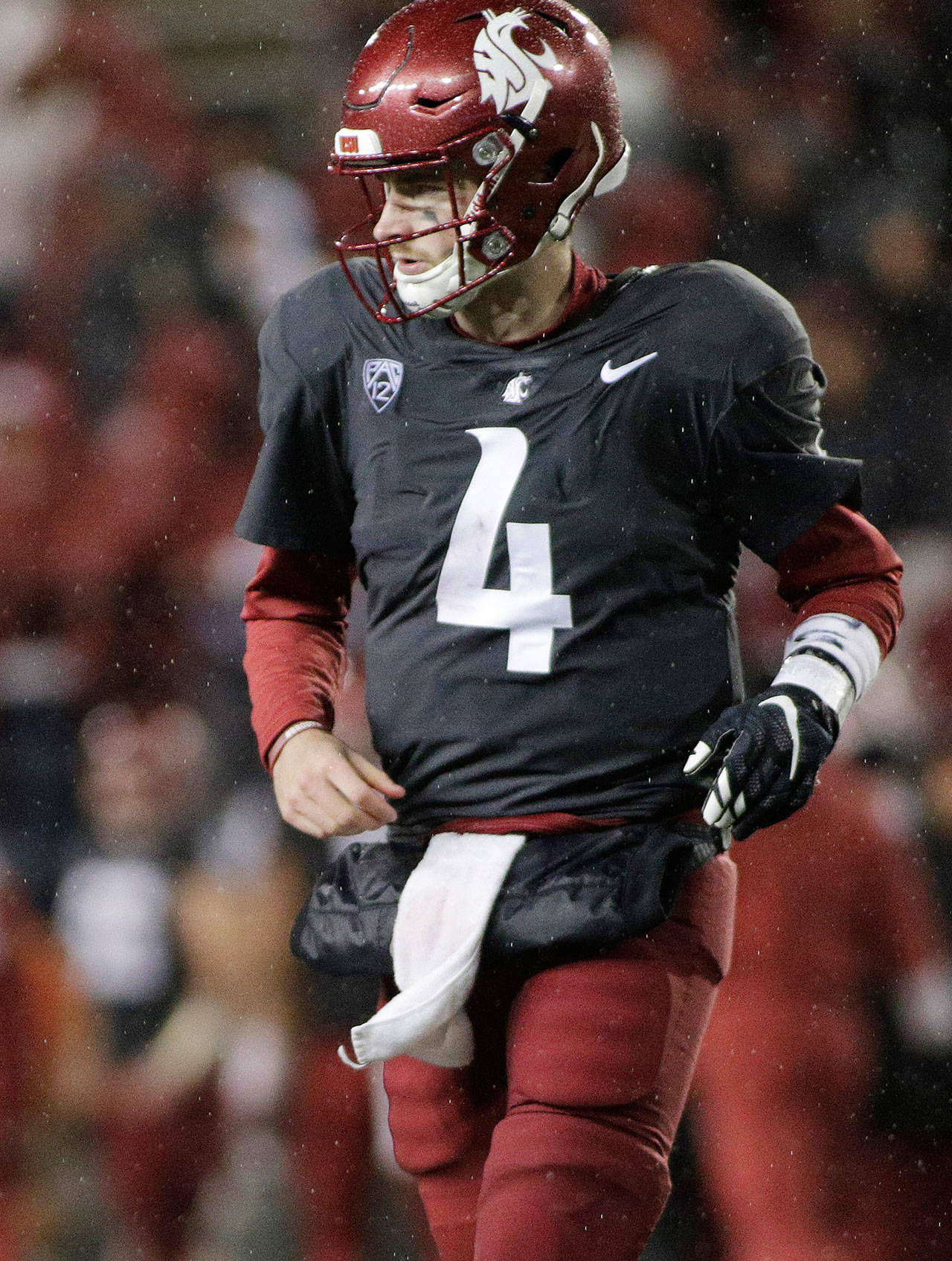 Washington State quarterback Luke Falk (4) runs on the field during the second half of a game against Colorado on Oct. 21, 2017, in Pullman. (AP Photo/Young Kwak)