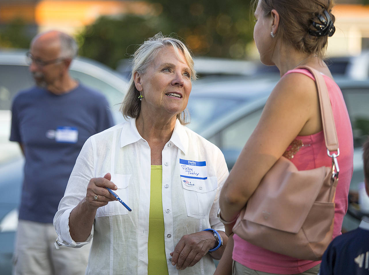Mayoral candidate Judy Tuohy talks with voters at a National Night Out event held at the Evergreen Branch Library on Aug. 1 in Everett. (Andy Bronson / Herald file)