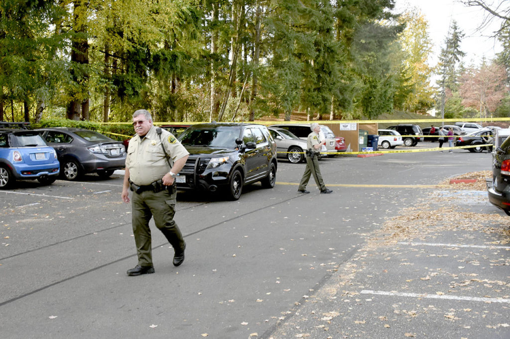 Snohomish County sheriff’s deputies cordoned a section of the Brisa apartments Tuesday afternoon south of Everett. (Caleb Hutton / The Herald)
