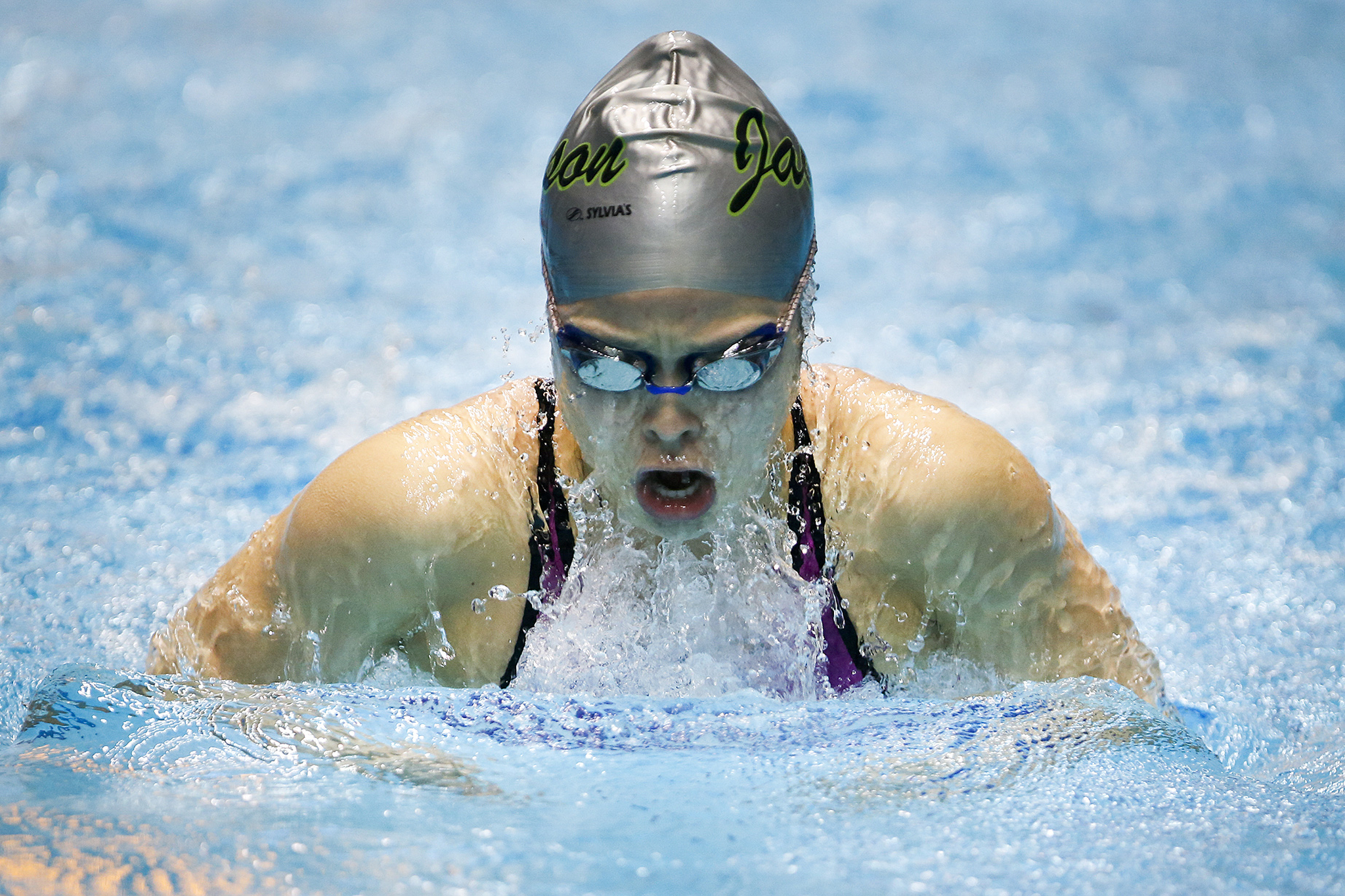 Jackson’s Nicole Limberg glides through the water on her way to winning the 100-yard breaststroke race at the 4A State Girls Swimming and Diving Championship at the King County Aquatic Center in Federal Way on Saturday, Nov. 12. (Ian Terry / The Herald)