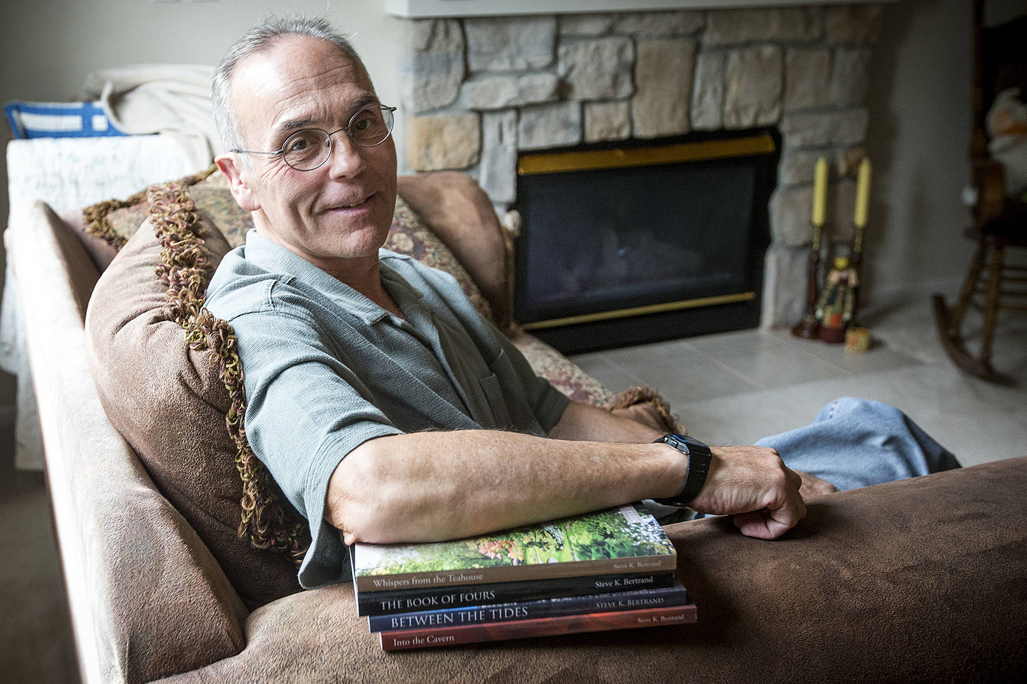 Along with being a high school running coach and teacher, Steve K. Bertrand, of Mukilteo, is also a haiku poet and author. (Ian Terry / The Herald)