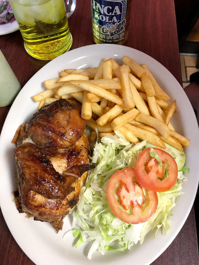 Get an Inca Kola to go with your half-chicken plate, complete with fries and salad. (Gale Fiege / The Herald)
