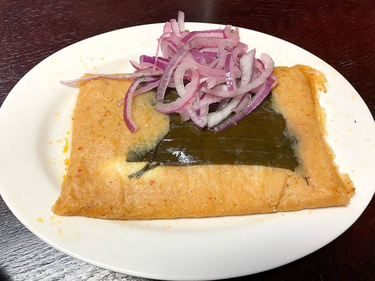 San Fernando’s tamale is a delicious blend of cornmeal, eggs and pork.