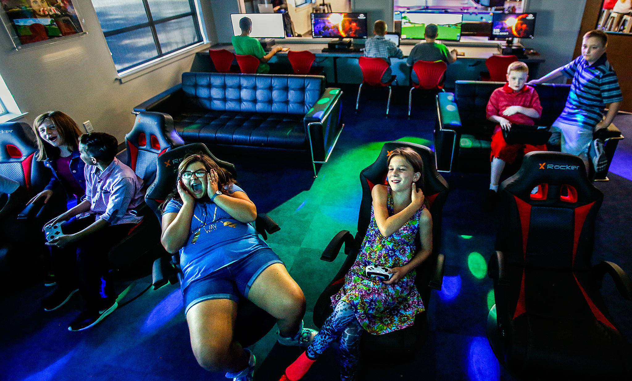 Mostly middle-school kids enjoy playing games on big-screen sets at the Teen Center at the Lake Stevens Boys and Girls Club. (Dan Bates / The Herald)