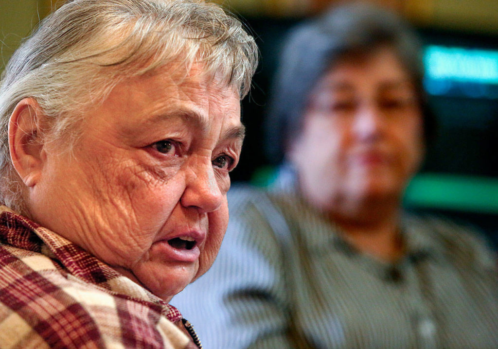 Shirley Lidel, 68 (left), shares some of her more difficult experiences. (Dan Bates / The Herald)
