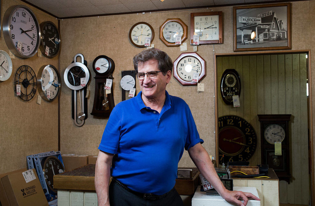 Dave Nofziger stands in the family’s shop, A House of Clocks, on Monday in Lynnwood. The landmark Lynnwood shop plans to close after more than 54 years. Nofziger said he and his siblings, who took over the business from their parents, are closing the shop because they’re reaching retirement age. (Andy Bronson / The Herald)
