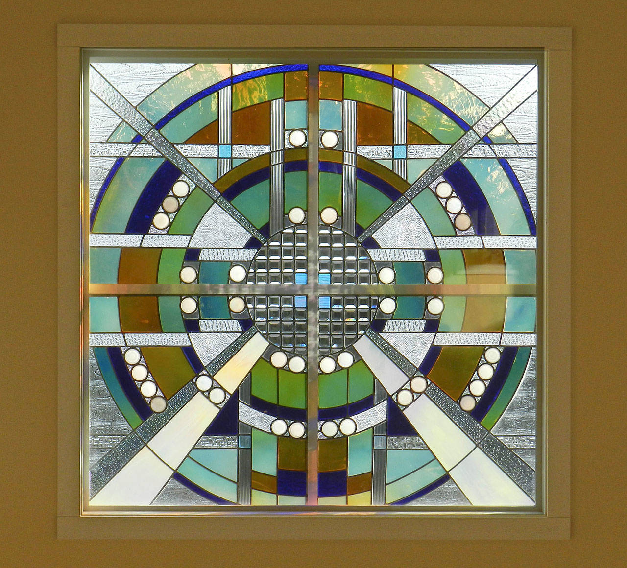 Camano Island glass artist Jack Archibald recently donated this large window to the Camano Center’s Second Chance Thrift Store. Titled “Future Cannery,” the peice used about 40 recycled canning jar lids. Archibald’s work, much of it donated, can be viewed at the fire stations on Camano and many other places in north Snohomish County.