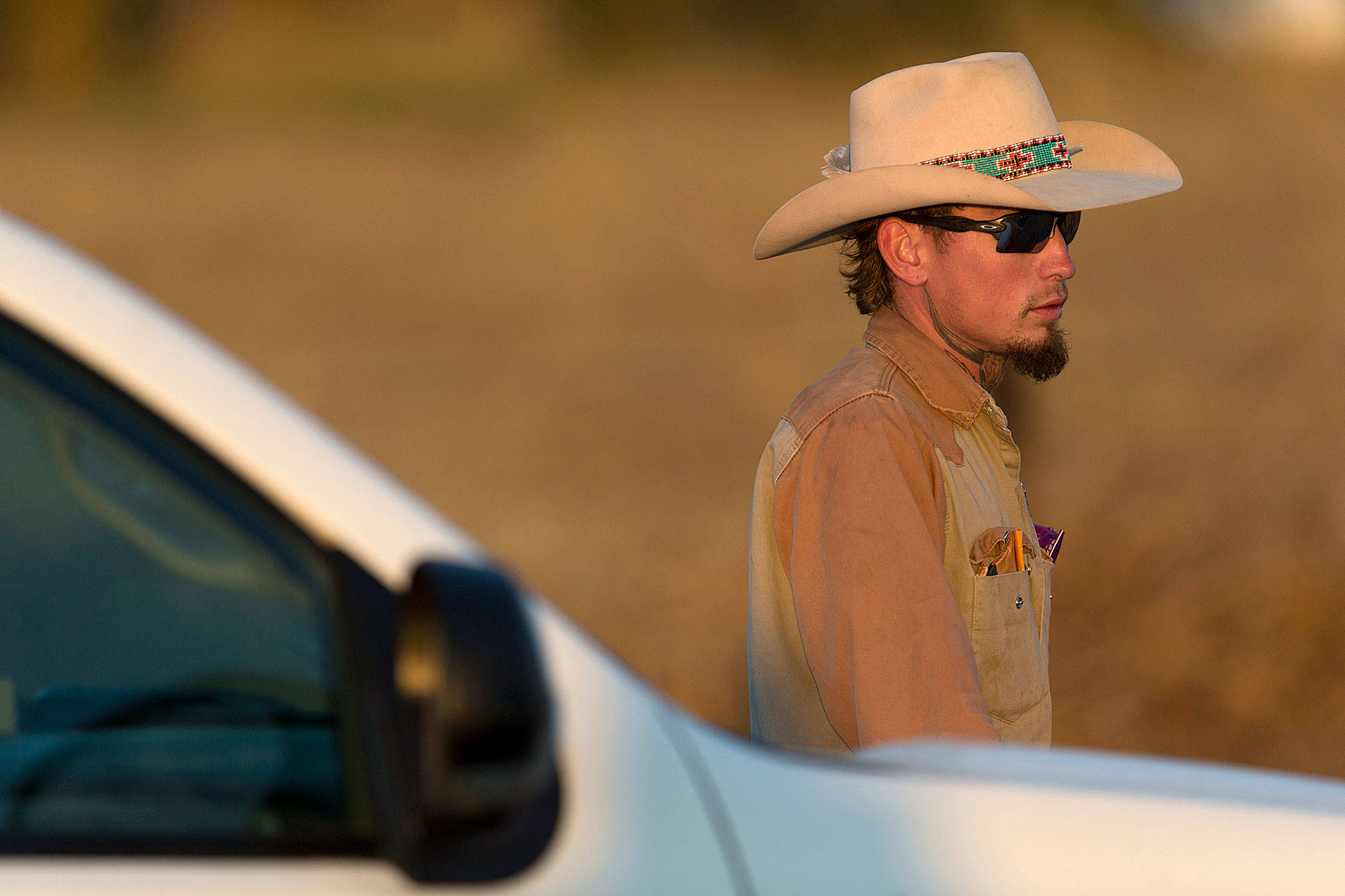 Johnny Langendorff said he pursued a suspect in the deadly church shooting in Sutherland Springs, Texas. Here he waits to be picked up from the scene where the suspect was found dead. (William Luther/The San Antonio Express-News via AP)