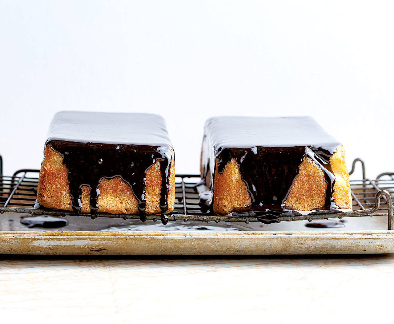 Peden + Munk photos Belinda’s Flourless Coconut and Chocolate Cake is among the recipes in the cookbook “Sweet.” (Peden + Munk photo)