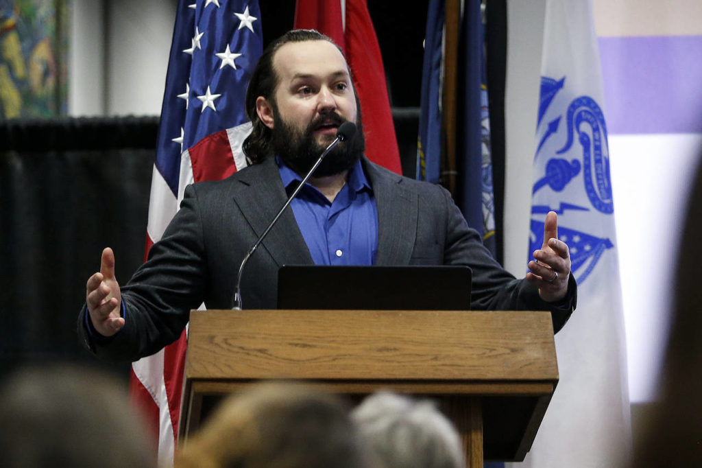 Calvin Evans, of Marysville, speaks at a reception for veterans at UW Bothell on Wednesday. (Ian Terry / The Herald)
