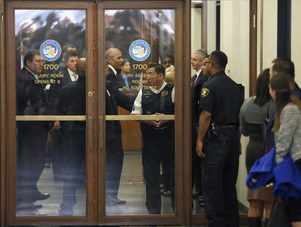 Former President Barack Obama arrives for jury duty in the Daley Center on Wednesday in Chicago. (Nancy Stone/Chicago Tribune via AP)
