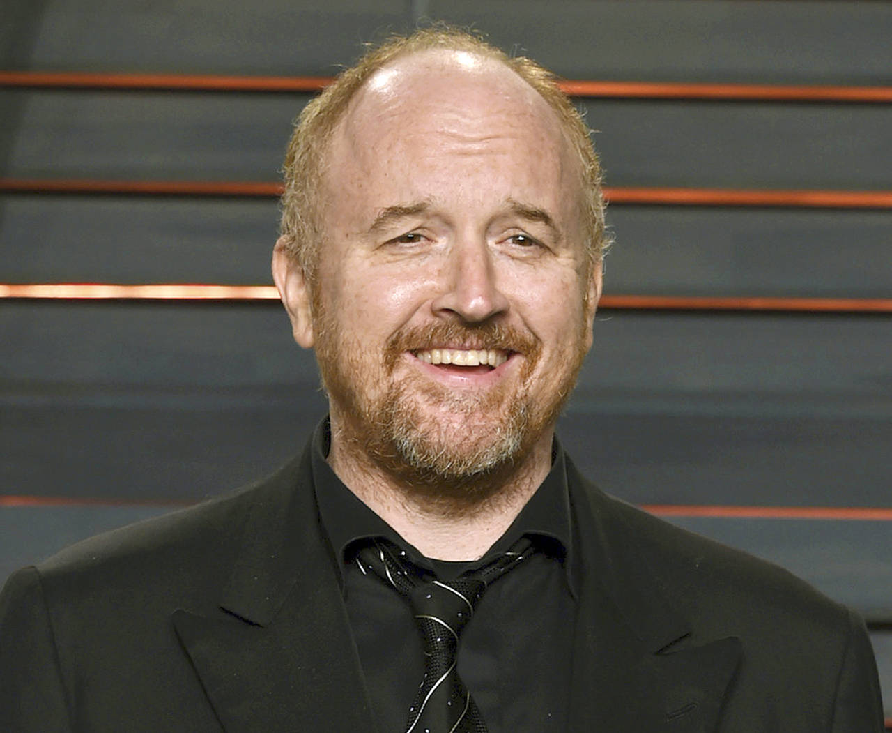 In this 2016 photo, Louis C.K. arrives at the Vanity Fair Oscar Party in Beverly Hills, California. (Evan Agostini/Invision/AP, File)