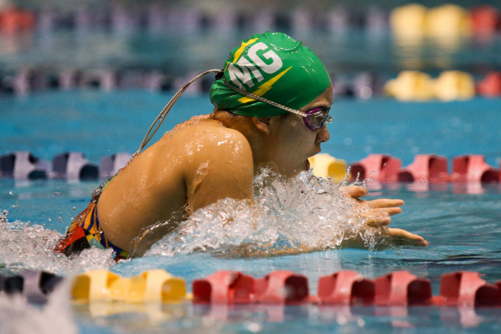 Marysville Getchell’s Bindi Pedersen races through the breaststroke in the 200-yard IM at the 3A state swim and dive championships on Nov. 11, 2017, at the King County Aquatic Center in Federal Way. (Kevin Clark / The Herald)
