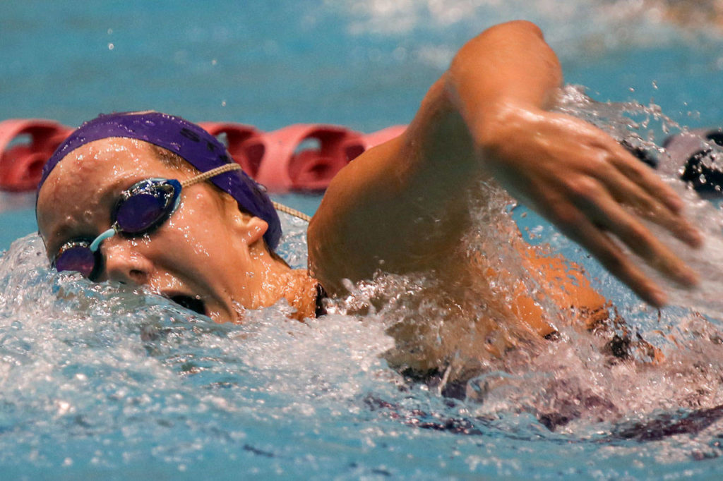 Kamiak’s Elli Straume races through the 200-yard freestyle during the 4A state swim and dive championships on Nov. 11, 2017, at the King County Aquatic Center in Federal Way. Straume finished second in the event. (Kevin Clark / The Herald)
