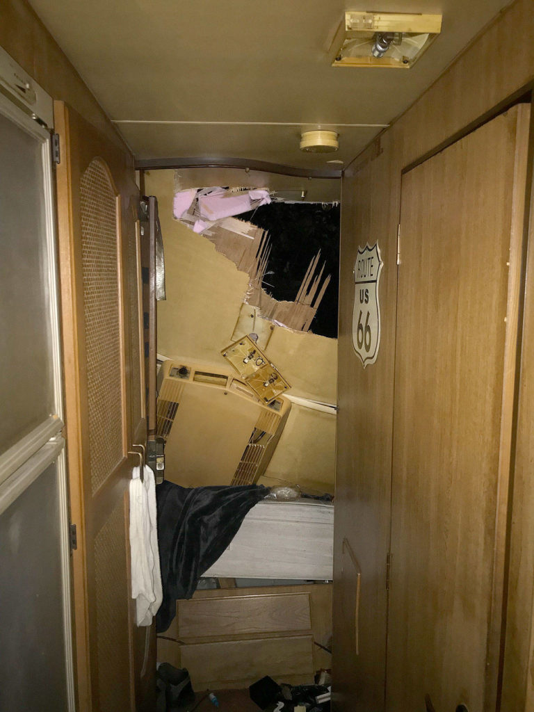 A falling tree struck the back of an RV parked next to a residence in Arlington on Monday, hitting an occupant. The man was able to get himself out of the RV and was transported to Cascade Valley Hospital by Arlington Fire with non-life threatening injuries. (Arlington Fire)
