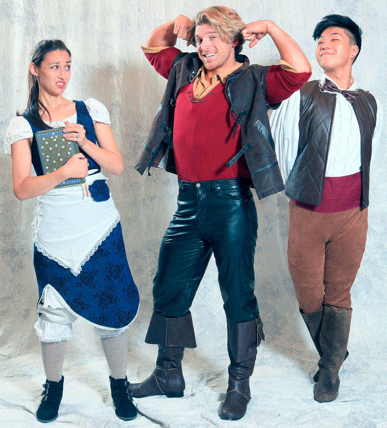 Liz Oyama as Belle, Jimmi Cook as Gaston and John Han as Lefou star in the Edmonds Driftwood Players production of Disney’s “Beauty and the Beast,” opening Nov. 24. Magic Photo