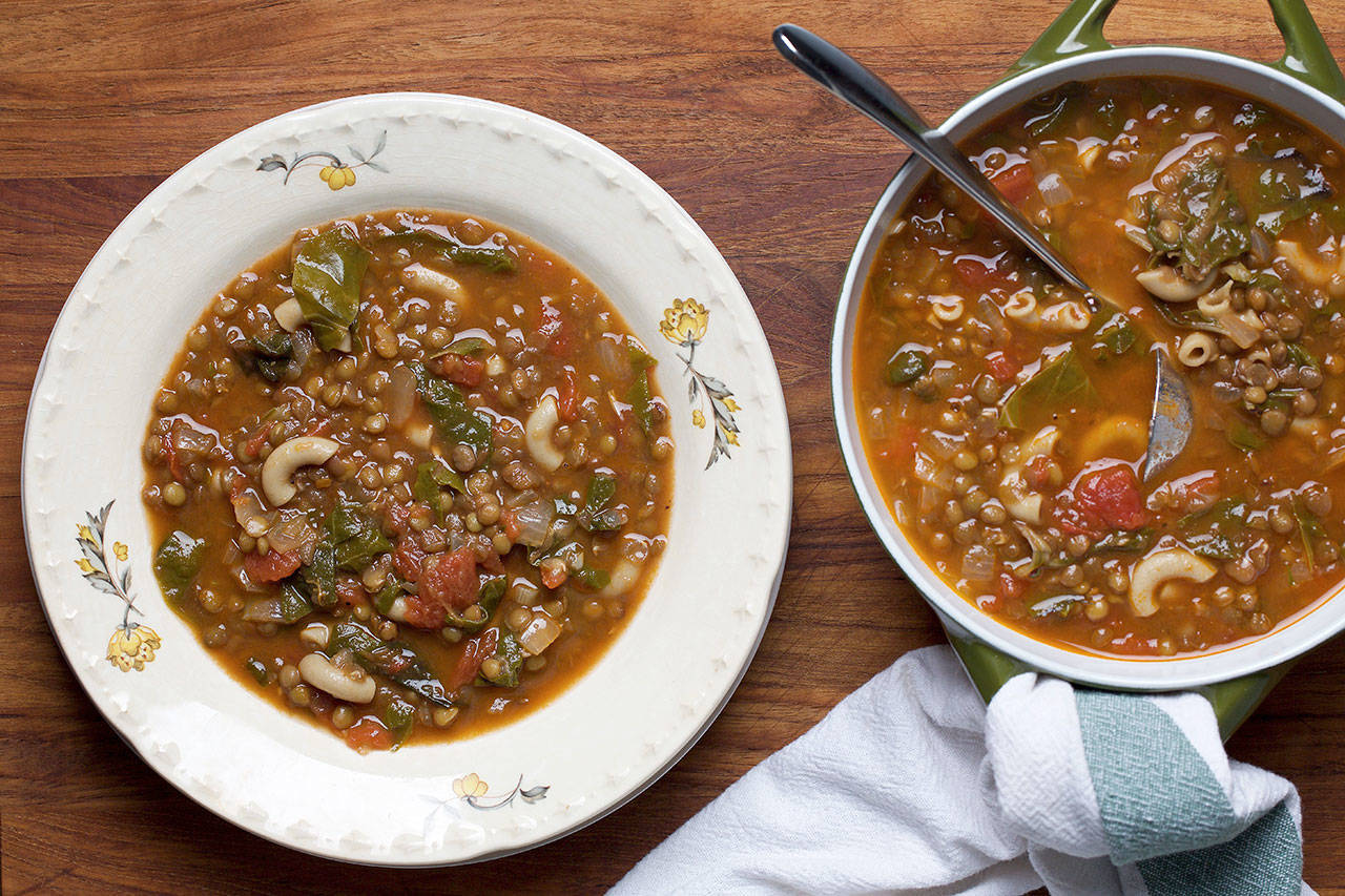 Lentil and macaroni soup with Swiss chard is seasoned with a mellow mix of Middle Eastern spices. It is a one-pot meal perfect for the weekend. (Photo by Deb Lindsey for The Washington Post)