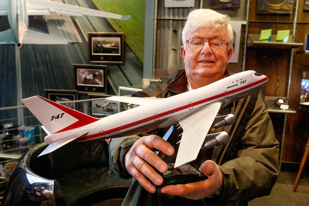 While waiting to go on a tour at the Boeing Store in the Future of Flight Aviation Center on Thursday, George Sefrit, who’s from Birch Bay near Blaine, gets a close-up look at the original 747 jumbo jet in the form of a replica made to scale. This one, made with a resin body, sells for $195. (Dan Bates / The Herald)
