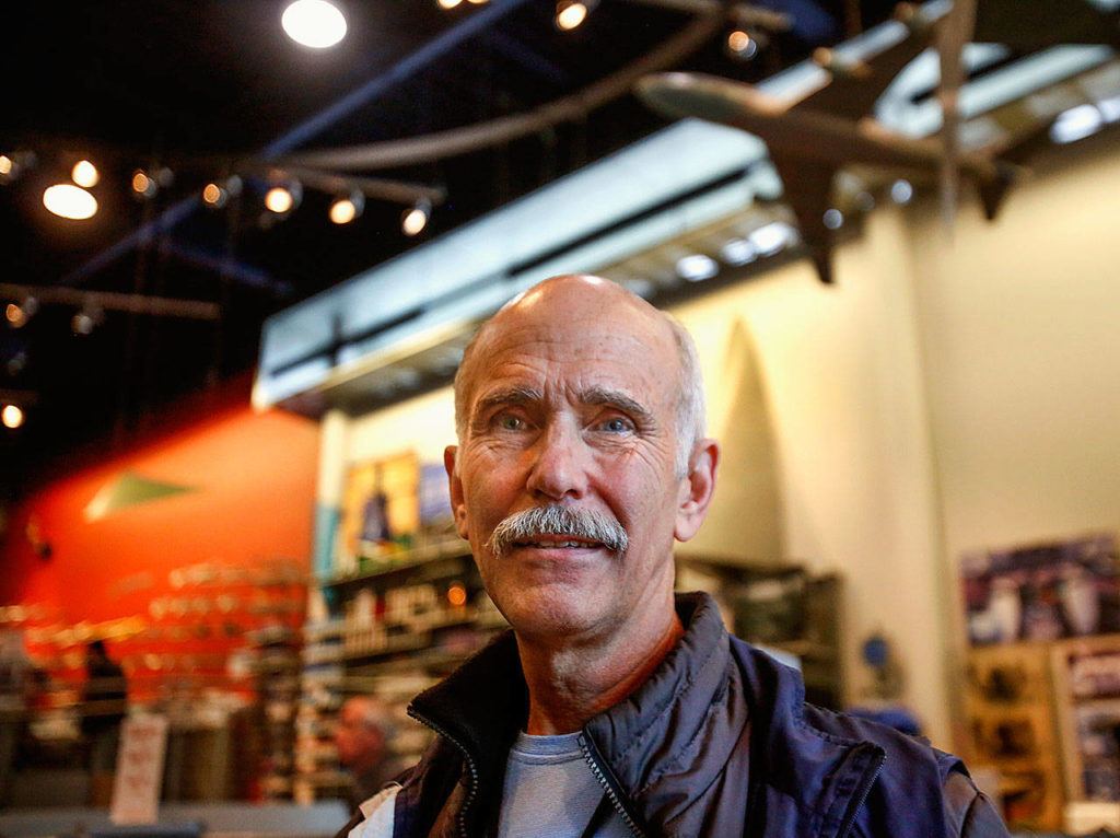 In the Boeing Store, Boeing tour guide Paul Moskvin talks about the iconic 747. “It’s an amazing airplane. It is kind of sad to see that era pass.” (Dan Bates / The Herald)
