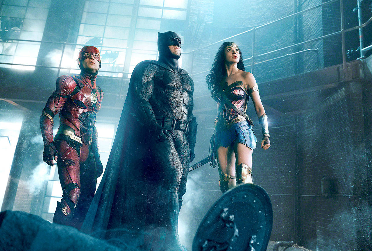 Ezra Miller as The Flash, Ben Affleck as Batman and Gal Gadot as Wonder Woman in “Justice League.” (Warner Bros. Pictures)