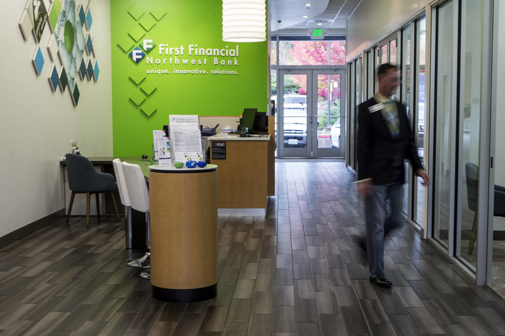 Open and colorful interiors are a hallmark of First Financial Northwest Bank’s locations. (Ian Terry / The Herald)
