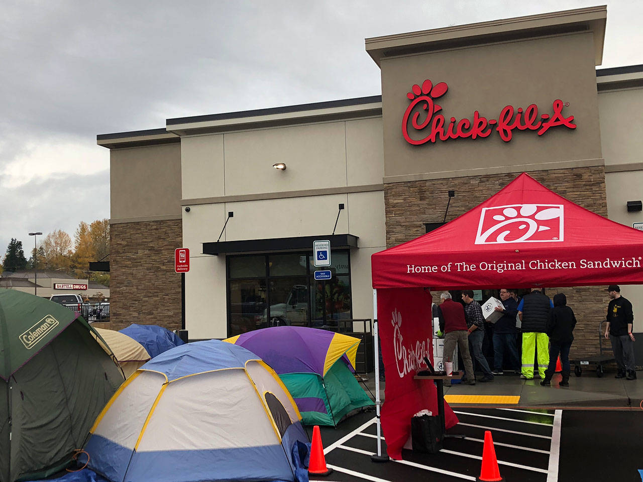 Campers line up outside of the Chick-fil-A at Bothell Canyon in Bothell on Wednesday. They helped pack meals for people in need. (Contributed photo)