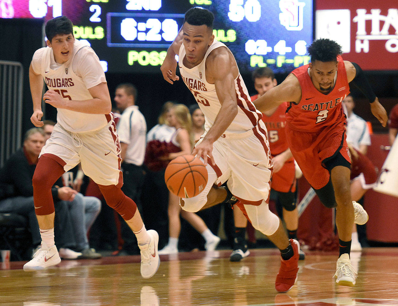 Washington States Arinze Chidom (center) steals the ball from Seattles Jordan Hill (right) during the second half of the Cougars 75-59 win over the Redhawks on Wednesday in Pullman. (Pete Caster/The Lewiston Tribune via AP)