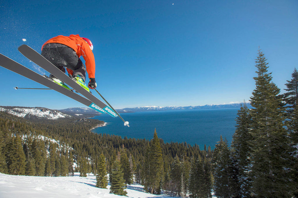 Professional skier Errol Kerr catches both air and views of Lake Tahoe while skiing at Homewood Mountain Resort. (Ryan Salm Photography / North Lake Tahoe)
