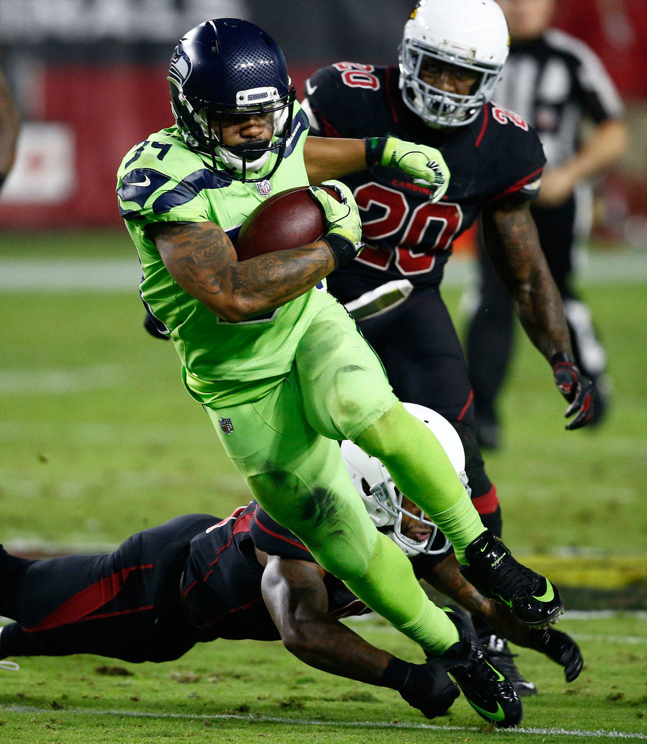 Seattles Thomas Rawls runs the ball in the first half of a Nov. 9 game in Glendale, Ariz. (AP Photo/Ross D. Franklin)