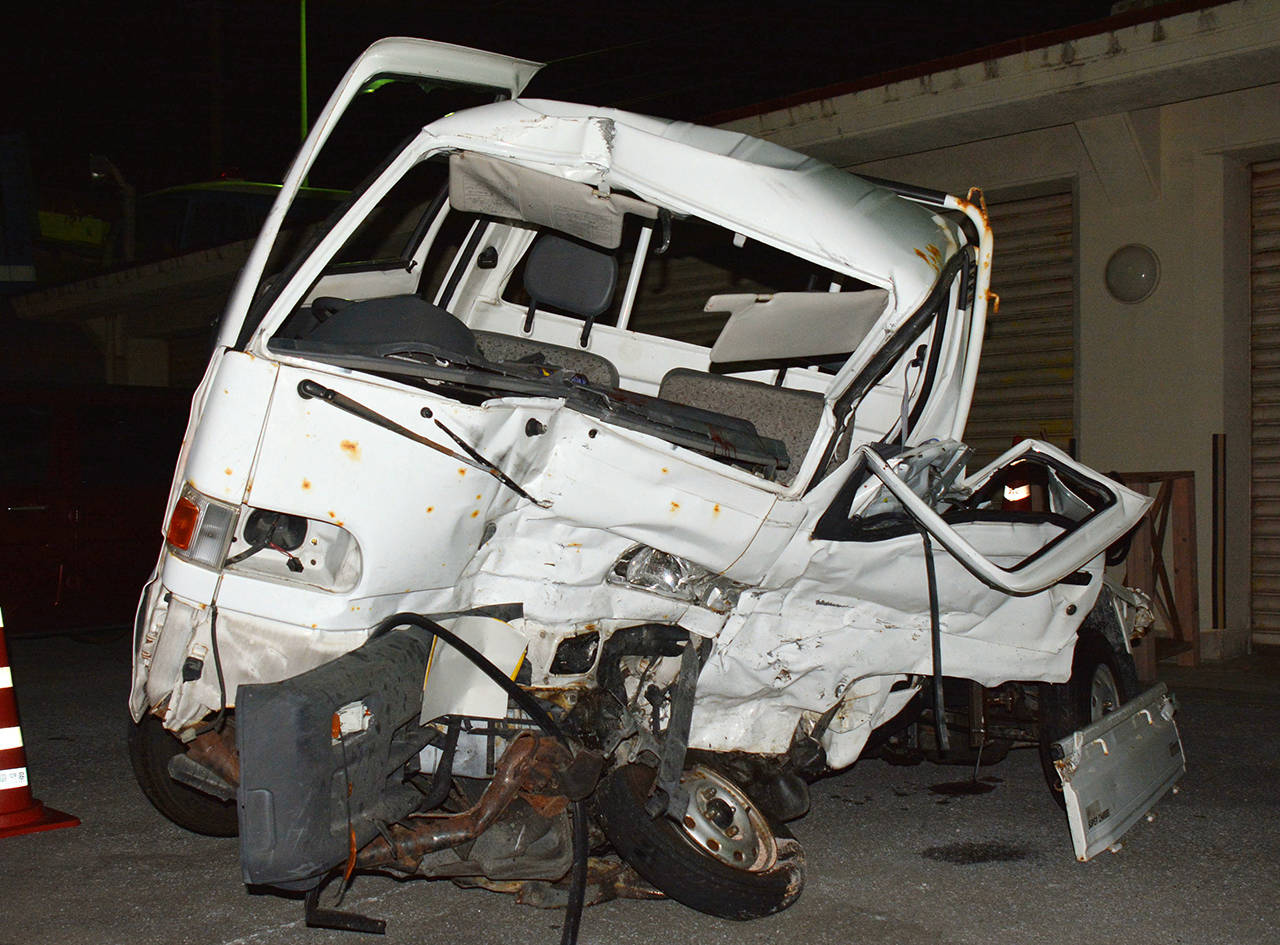 A Japanese drivers damaged vehicle is placed at a police station in Naha, Okinawa, southern Japan, on Sunday. (Kazuki Sawada/Kyodo News via AP)