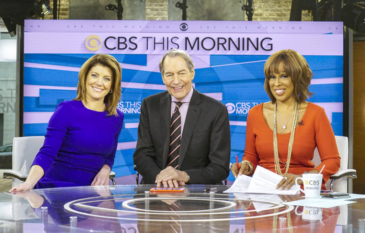 This image shows, (rom left) Norah O’Donnell, Charlie Rose and Gayle King on the set of “CBS This Morning.” (CBS via AP)