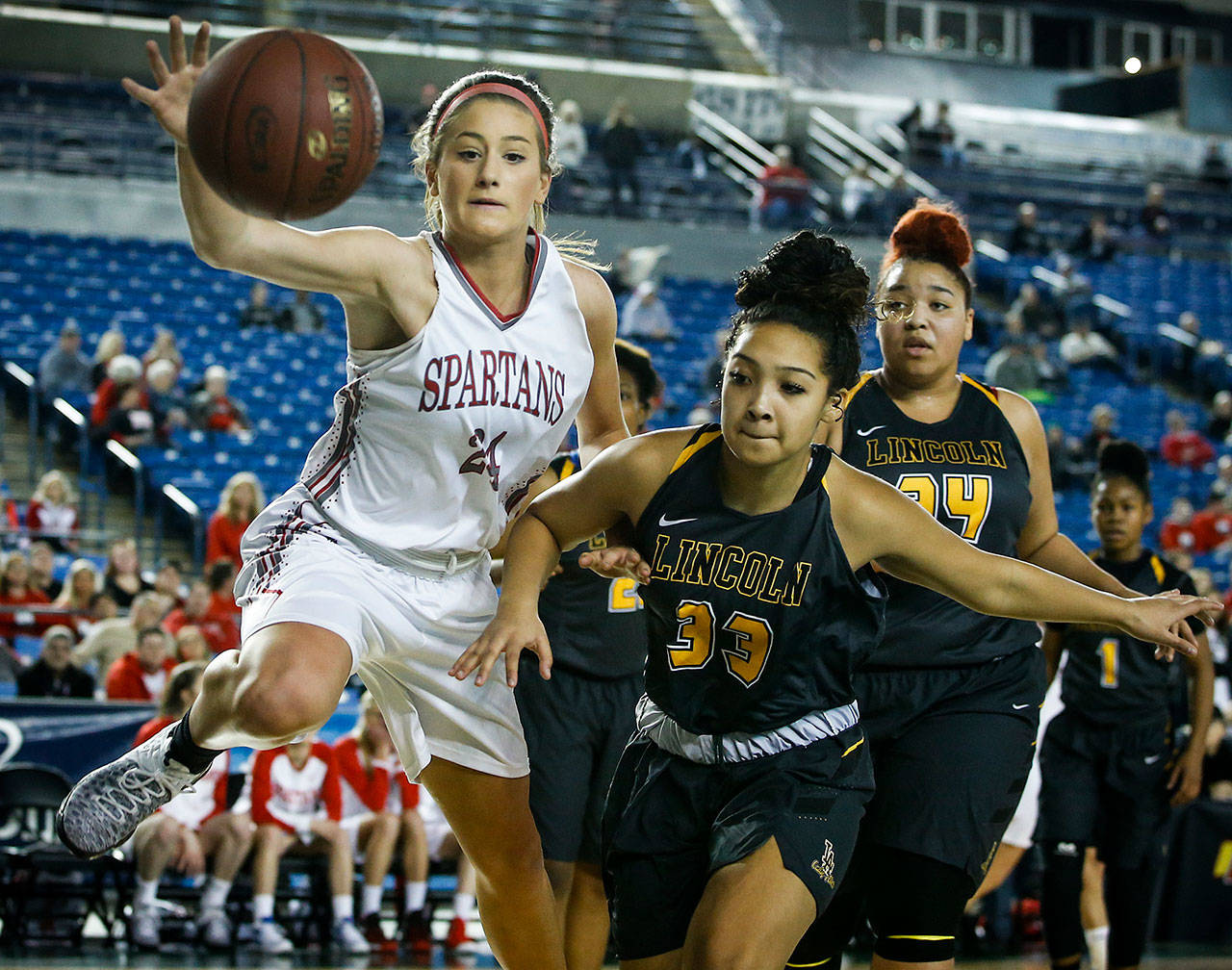 Jillian Heichel (left) is part of a Stanwood team that returns all but one of its players from a squad that reached the state tournament last season and is among the favorites to win the Wesco 3A championship. (Ian Terry / The Herald)