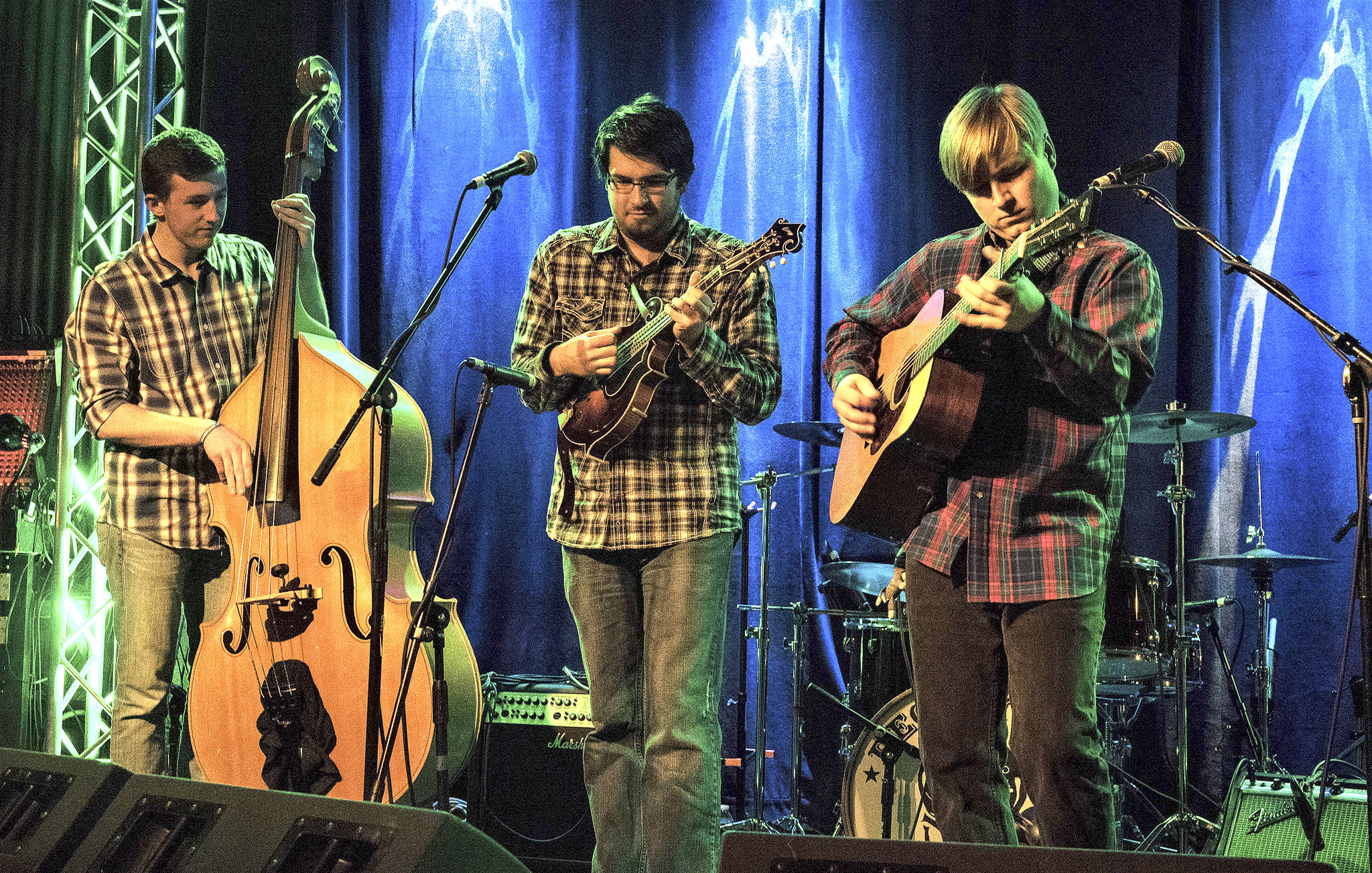 From left, bassist Conner Hutteball, mandolinist Nick Dumas and guitarist Chris Luquette are set to perform Dec. 2 at the Tim Noah Thumbnail Theater in Snohomish.