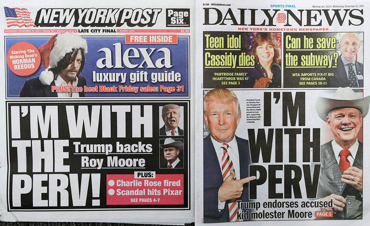 The New York Post and New York Daily News will often tackle the same topics on their front page. Both were reporting Wednesday on President Donald Trump’s backing of Republican Alabama Senate candidate Roy Moore, who is accused of molesting a 14-year-old girl decades ago. Moore denies the charge. (Mark Lennihan / Associated Press)