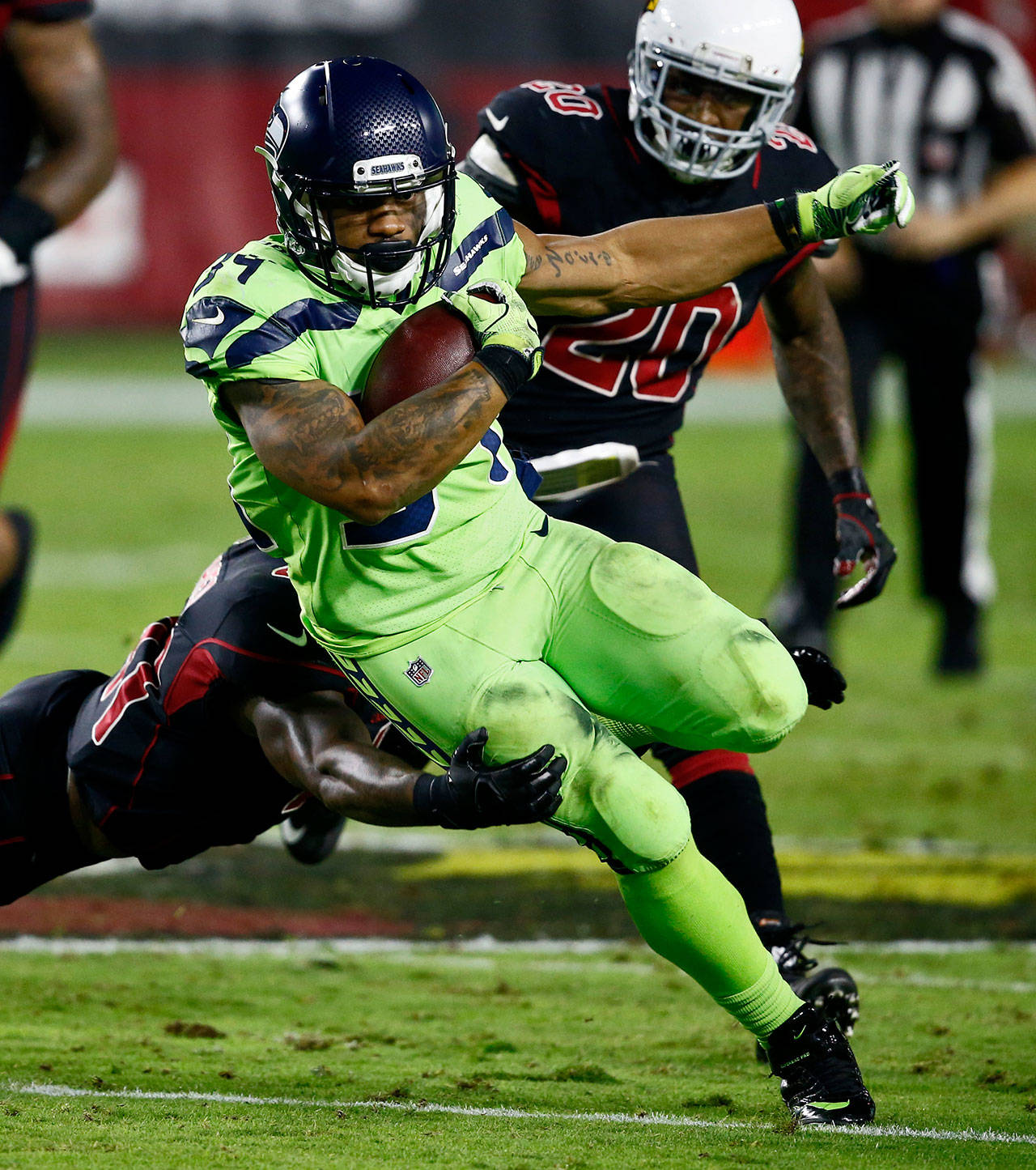Seahawks running back Thomas Rawls (34) runs the ball against the Cardinals during the first half of a game Nov. 9, 2017, in Glendale, Ariz. (AP Photo/Ross D. Franklin)