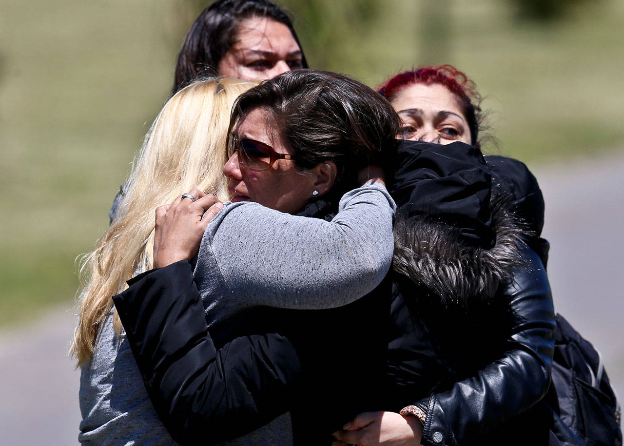 Relatives of missing submarine crew member Celso Oscar Vallejo react to the news that a sound detected during the search for the ARA San Juan submarine is consistent with that of an explosion, at the Mar de Plata Naval Base in Argentina, on Thursday,. A Navy spokesman said that the relatives of the crew have been informed and that the search will continue until there is full certainty about the fate of the submarine. (Esteban Felix / Associated Press)