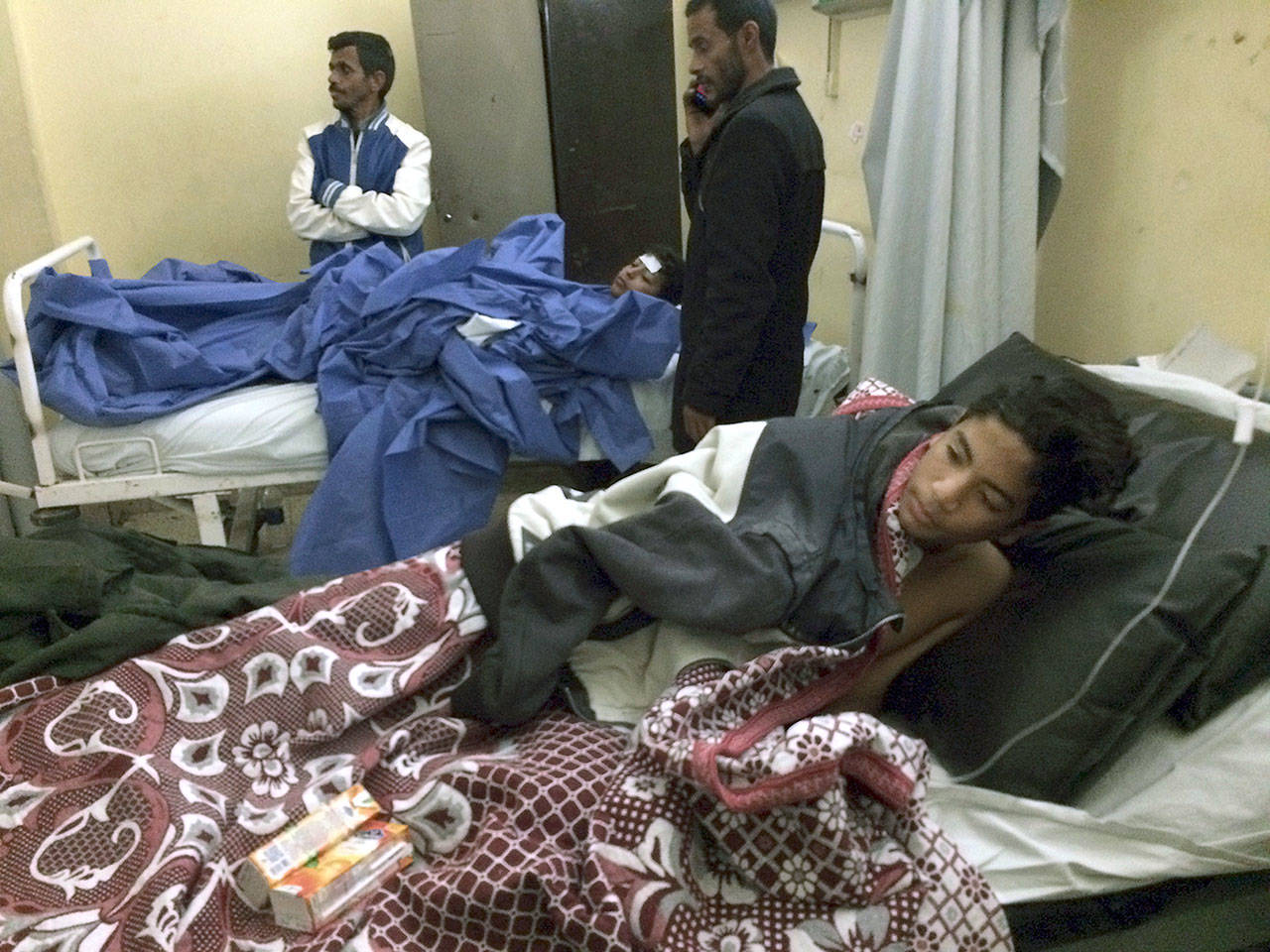 Abdallah Abdel Nasser, 14, receives medical treatment at Suez Canal University hospital in Ismailia, Egypt, on Friday after he was in injured during an attack on a mosque. (AP Photo/Amr Nabil)